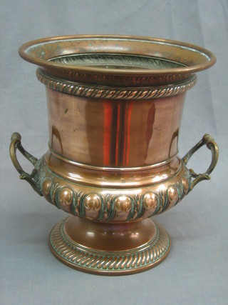 A copper twin handled wine cooler