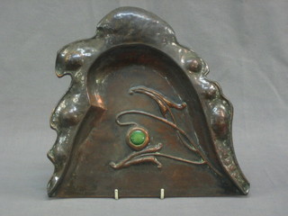 An Art Nouveau embossed copper crumb tray inset a hard stone 10"