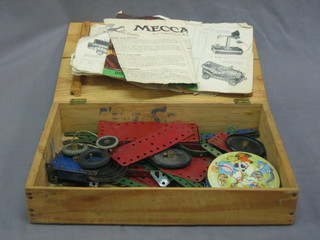 A small Meccano set, red and green contained in a wooden box 13"