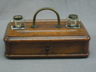 A wooden standish with 2 ink wells fitted a drawer 10"