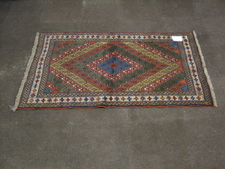 A contemporary Afghan rug with all-over geometric design 72" x  43"