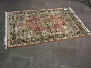A contemporary rust coloured Persian style Belgian cotton rug 91" x 59"