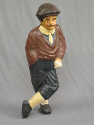 A 1930's papier mache shop advertising figure in the form of a standing golfer 36"