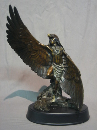 Dan Garrett, a modern bronze figure of a standing Red Indian God/warrior "One With The Eagle" 14"