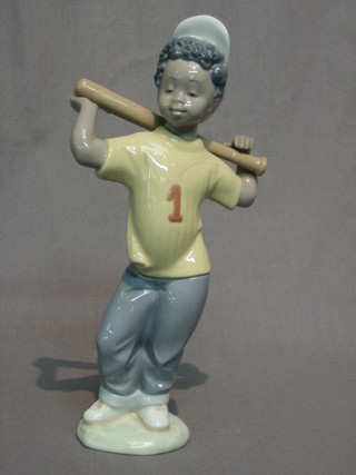 A Lladro figure of a standing boy with baseball bat 9"
