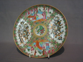 A 19th Century Canton famille rose circular porcelain plate with panel decoration of court scenes (chip to top reverse) 9 1/2"