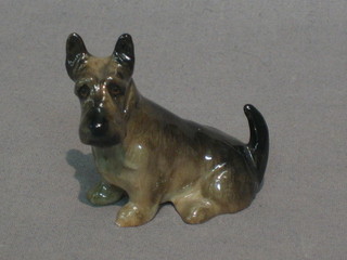 A Royal Doulton figure of a seated Cairn Terrier, the base marked K18, 2"