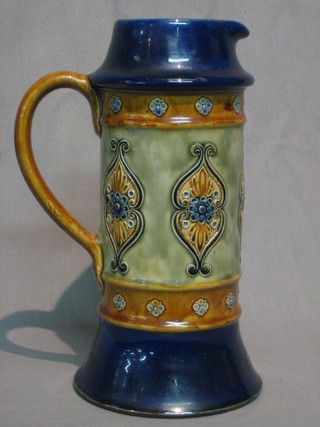 A Royal Doulton stoneware jug, the base impressed Royal Doulton 1332 and With W H T Lamb & Sons Compliments Xmas 1912 11"