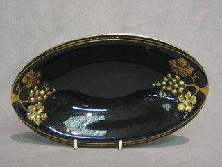 A black glazed Carltonware Noire Royal glazed dish with grape decoration 10"