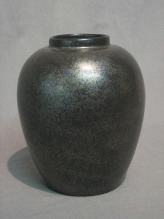 A black glazed Poole Pottery vase, the base marked Poole England 7"