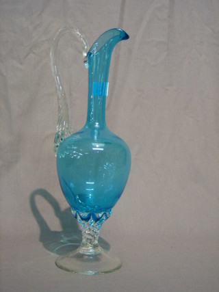 A blue glass ewer with clear glass handle 14"