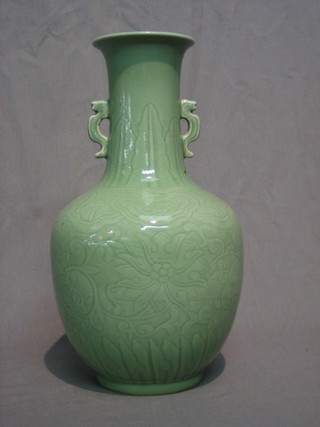 A late Chinese Celadon twin handled vase, the base with 6 character mark and impressed China 12"