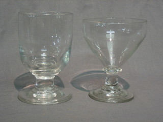 An 18th/19th Century funnel shaped rummer, a heavy rummer and 2 large wine glasses with faceted stems