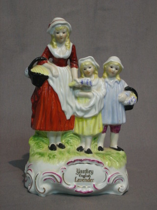 A Yardley's lavender figure group 8"
