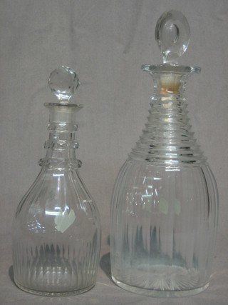 An 18th Century club shaped decanter and stopper 8" and 1 other 9 1/2"