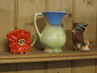 A Hornsea jug and 2 other decorative jugs