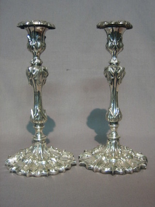 A handsome pair of 19th Century Rococo style silver plated candlesticks with detachable sconces 10"