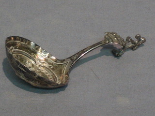 An embossed Dutch silver caddy spoon