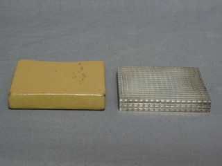 An Art Deco square silver compact with hobnail cut decoration Birmingham 1947