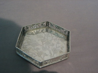 An Oriental octagonal pierced silver platter with gallery 4", raised on 3 bun feet