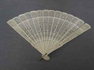 A pierced ivory fan 10"