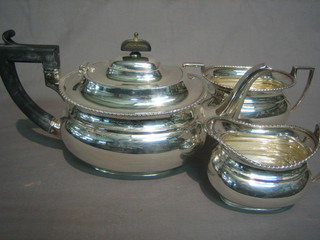 A Georgian style oval silver plated 3 piece tea service comprising teapot, twin handled sugar bowl and cream jug