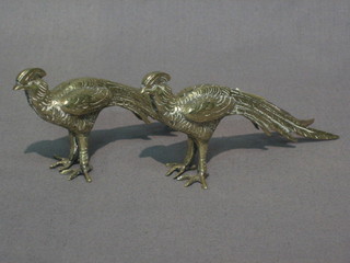 A pair of small silver plated table ornaments in the form of pheasants 5"