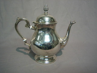 A silver plated coffee pot