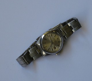 A lady's Rolex Oyster Perpetual date wristwatch contained in a stainless steel case   