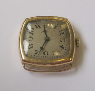 A wristwatch with square silver dial and Arabic numerals contained in a 14ct gold case