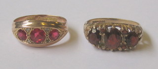 A 9ct gold dress ring set red stones and 1 other