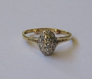 An 18ct gold cluster ring set numerous diamonds