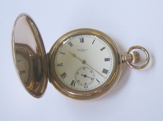 A Waltham pocket watch contained in a full hunter gold plated case