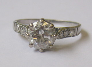 A lady's 18ct gold solitaire diamond dress/engagement ring