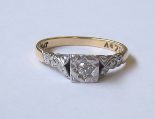 A lady's 18ct gold dress ring with an illusion set diamond 