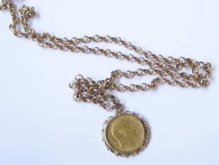 A hollow gold chain hung a 1902 Edward VII sovereign
