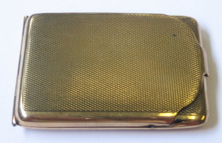 A 9ct gold match slip with engine turned decoration
