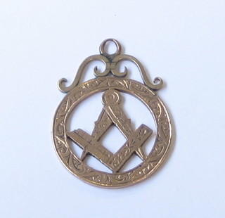 A pierced 9ct gold Masonic charm