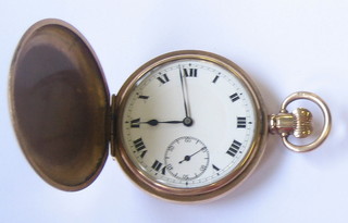 A gentleman's full hunter pocket watch contained in a rolled gold case
