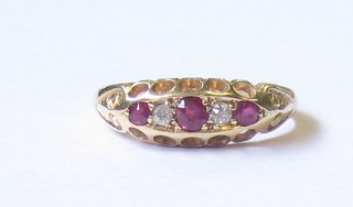 A lady's 18ct gold dress ring set 3 rubies and 2 diamonds