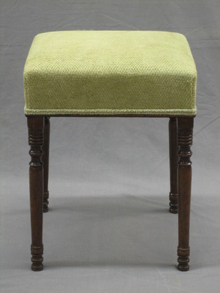 A Victorian square mahogany stool with upholstered seat, raised on turned supports 15"