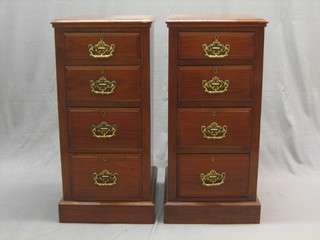 A pair of Edwardian mahogany pedestal chests of 4 long drawers, raised on platform bases (formerly a dressing table) 15"