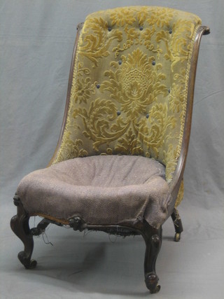 A William IV rosewood spoon back chair, raised on scrolled supports