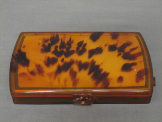 A 1930's tortoiseshell effect lady's vanity case with hinged lid 6 1/2"