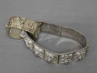 An Eastern silver collar and a ditto bracelet