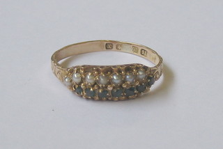 A Victorian 15ct gold dress ring set emerald and pearls