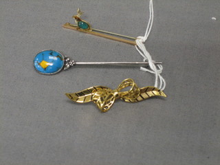 A 9ct gold and enamelled bar brooch in the form of a rabbit, a bar brooch set an oval turquoise and a gilt leaf brooch