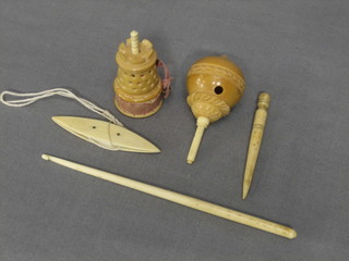 An ivory cased tape measure and  4 other ivory items