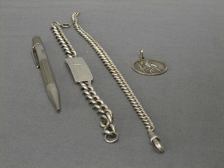 A silver identity bracelet, a silver curb link watch chain 9", a silver St Christopher medal and a silver propelling pencil