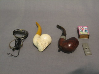 A  Meerschaum pipe, 1 other pipe, 2 monocles, a cigar cutter and a small cloisonne enamel match box case